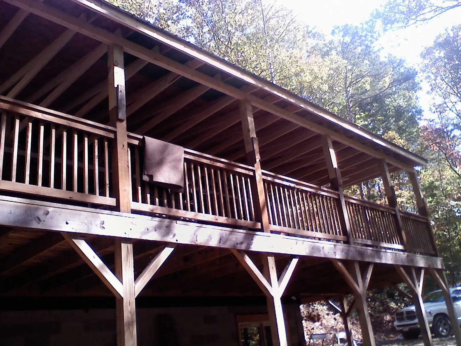 Timber framing under a new elevated porch and deck — Roof Leak Repair in Locust by Roofing Brothers